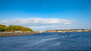 View of the River Tyne from Royal Quays, North Shields towards South Shields, Tyne and Wear, England, UK clipart