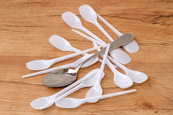 Metal and plastic spoon — Stock Photo, Image