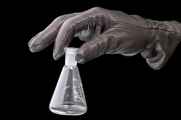 黑色的手套和化学玻璃灯泡 — 图库照片