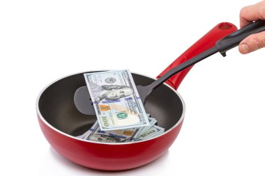 Yüz dolar bir tava üzerinde