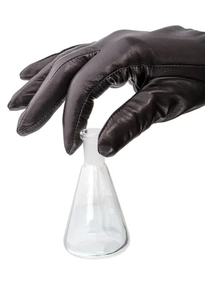 Hand in schwarzem Handschuh mit Chemieglasbirne — Stockfoto