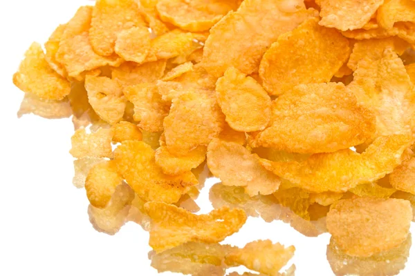 Crispy corn flakes on white — Stock Photo, Image