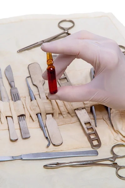 Hand with an ampoule — Stock Photo, Image