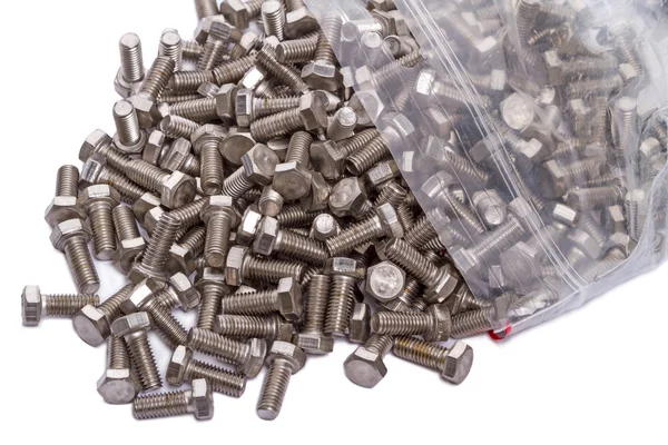 Chrome bolts in a plastic bag — Stock Photo, Image