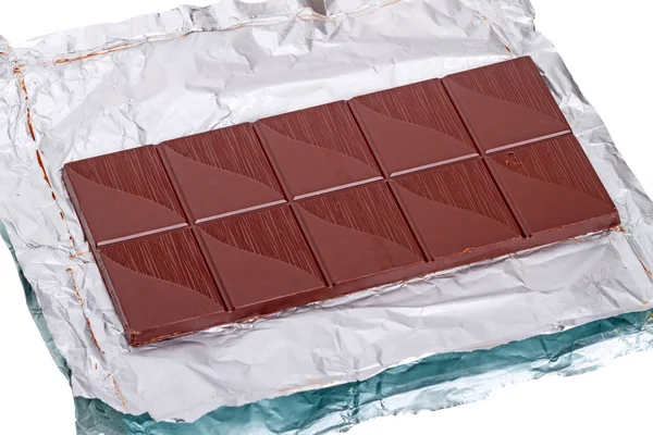 Bar of chocolate on a foil — Stock Photo, Image