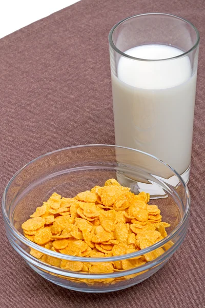 Cornflakes and glass of milk — Stock Photo, Image