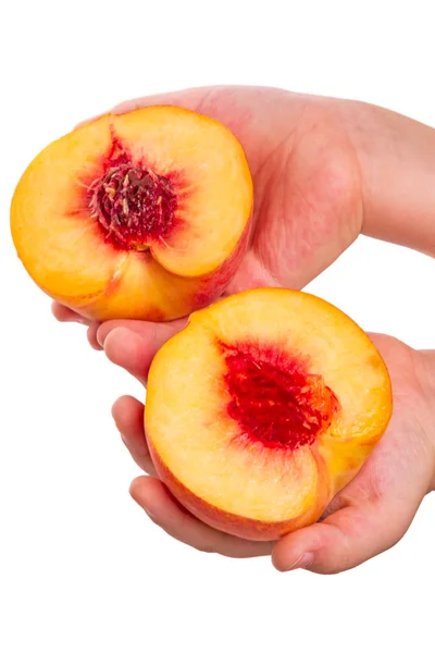 Child with Halves of  peach on white — Stock Photo, Image