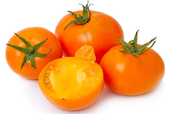 Tomates anaranjados sobre blanco —  Fotos de Stock