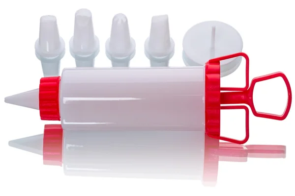 Confectionery syringe on white — Stock Photo, Image