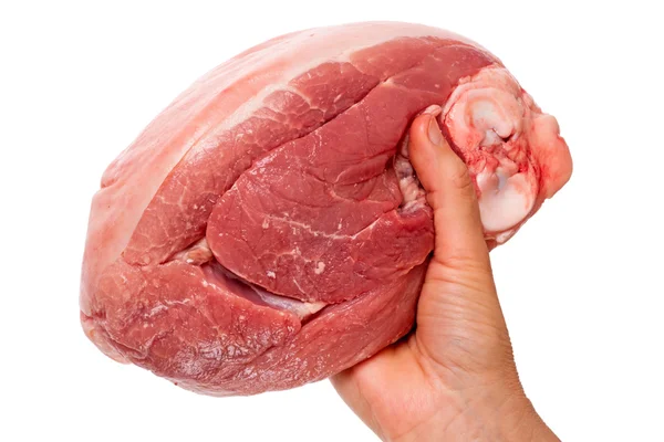 Hand med en stor bit kött — Stockfoto