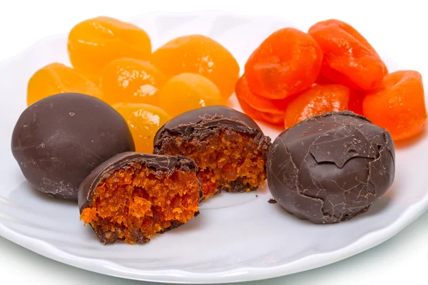 Cumquat en chocolade snoepjes — Stockfoto