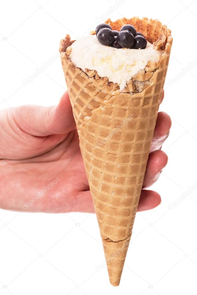 Ice-cream cone in hand