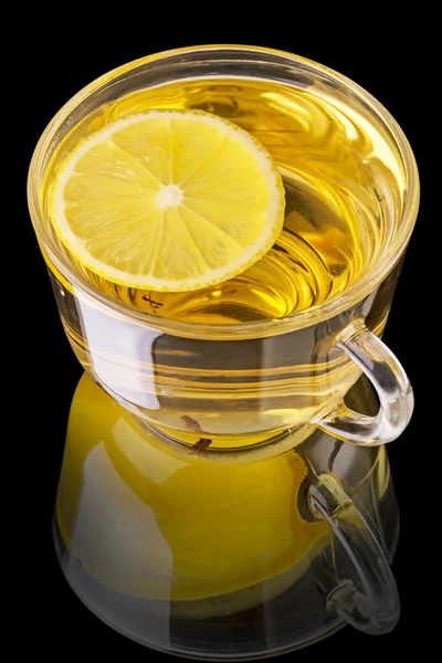 Cup of tea with lemon on black — Stock Photo, Image