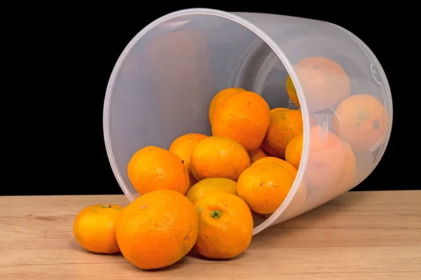 Frustrate bucket of bad mandarins
