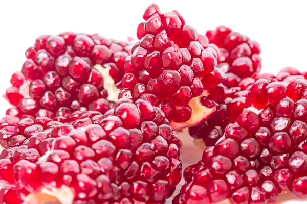 Piece of pomegranate on white — Stock Photo, Image