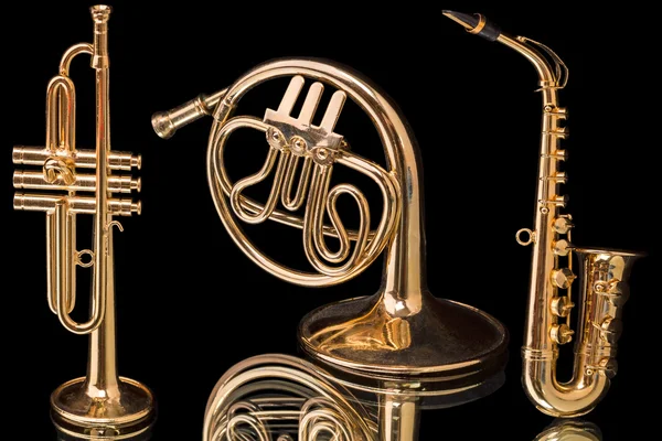 Brass on black — Stock Photo, Image