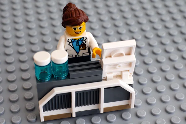 Lego scientist on her working place — Stock Photo, Image