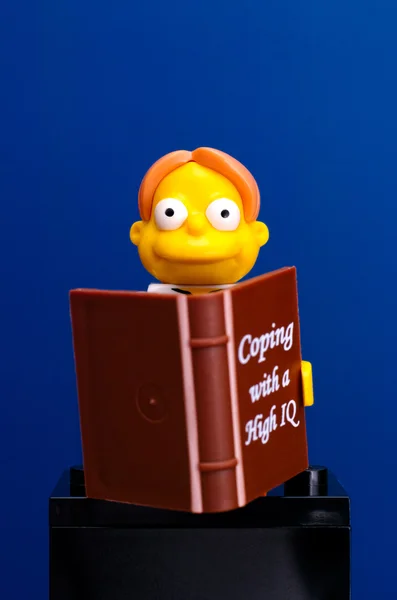 Lego martin prince mit buch — Stockfoto