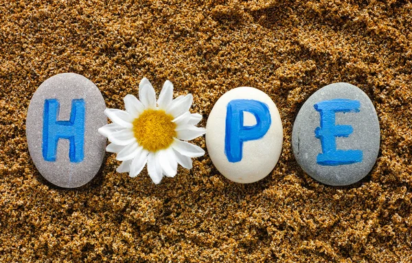 Word Hope spell out from stones with letters — Stock Photo, Image