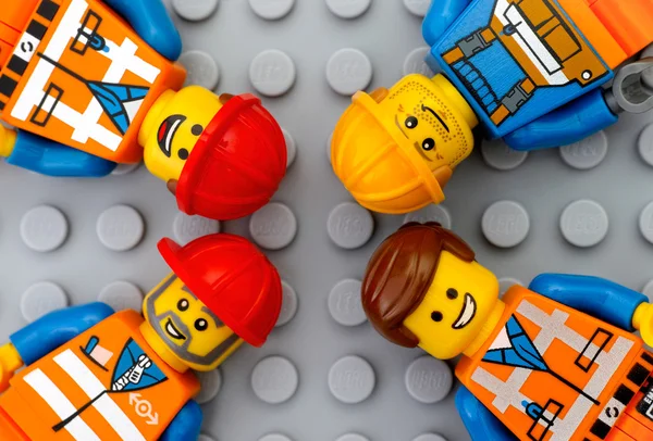 Four Lego workers minifigures — Stock Photo, Image