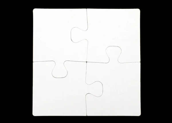 Quatro peças de quebra-cabeça estão conectadas — Fotografia de Stock