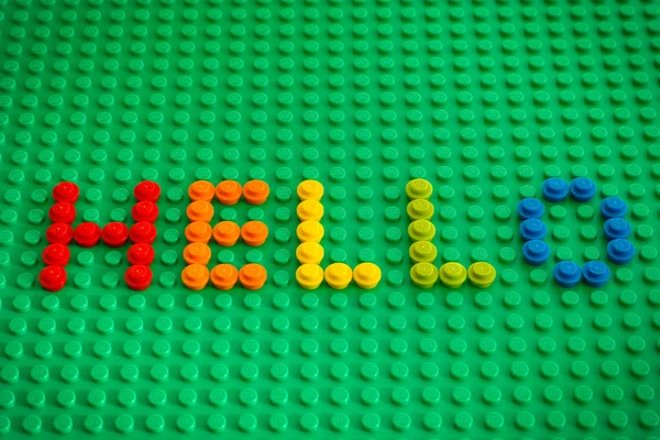 Word Hello spell out from Lego Round Bricks — Stock Photo, Image