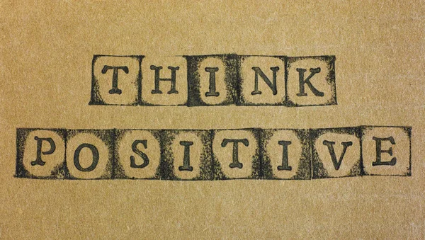 Words Think Positive on cardboard — Stock Photo, Image