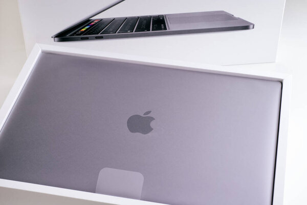 Tambov, Russian Federation - July 09, 2020 Unboxing new MacBook Pro.