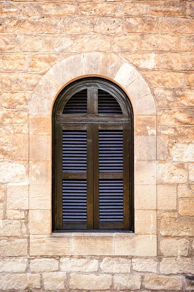 Arched Window Closed Shutters Yellow Stone Wall — Stock Photo, Image