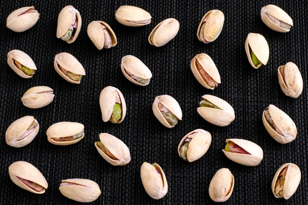 Lot Pistachio Nuts Black Napkin Background — Stock Photo, Image