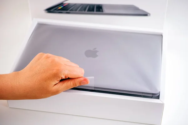 Tambov Russian Federation July 2020 Person Hand Unboxing New Macbook — Stock Photo, Image