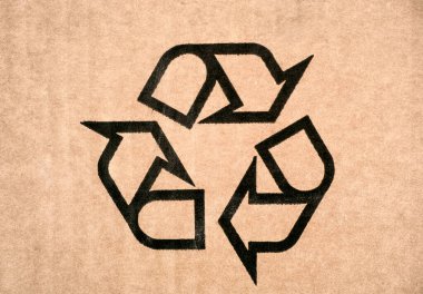 Kartondaki geri dönüşüm sembolü. Kırılgan ya da ambalaj sembolü. Yakın plan.