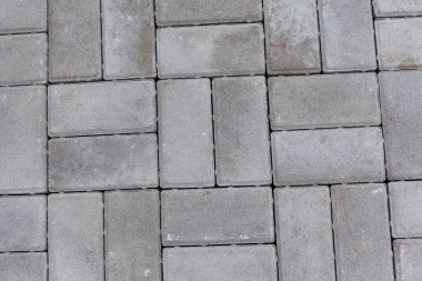 Gri taş kaldırım levhalarının arka planı. Tam çerçeve