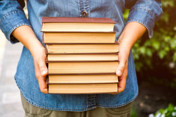 Woman Holds Stack Books Her Hands — Stock Photo, Image