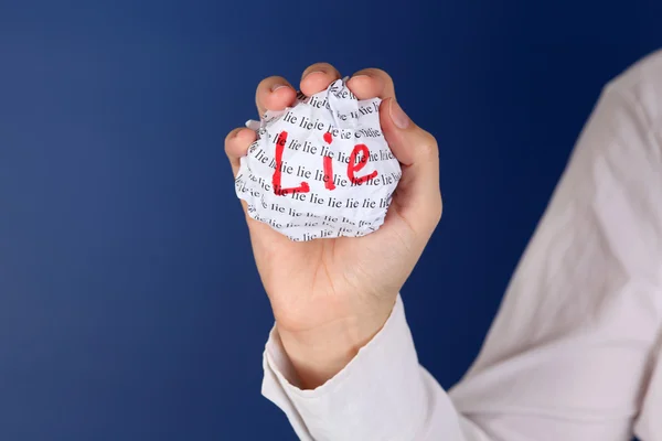 Crumpled paper ball with word Lie — Stock Photo, Image