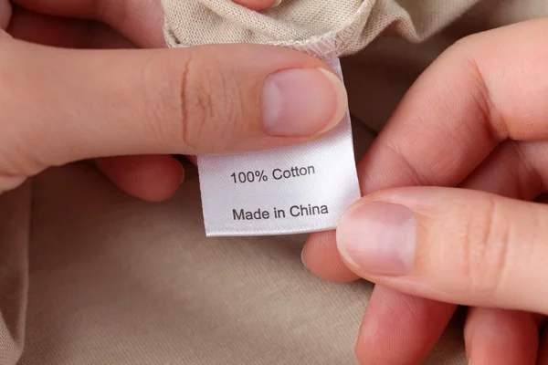 Clothes label. 100 percent cotton.