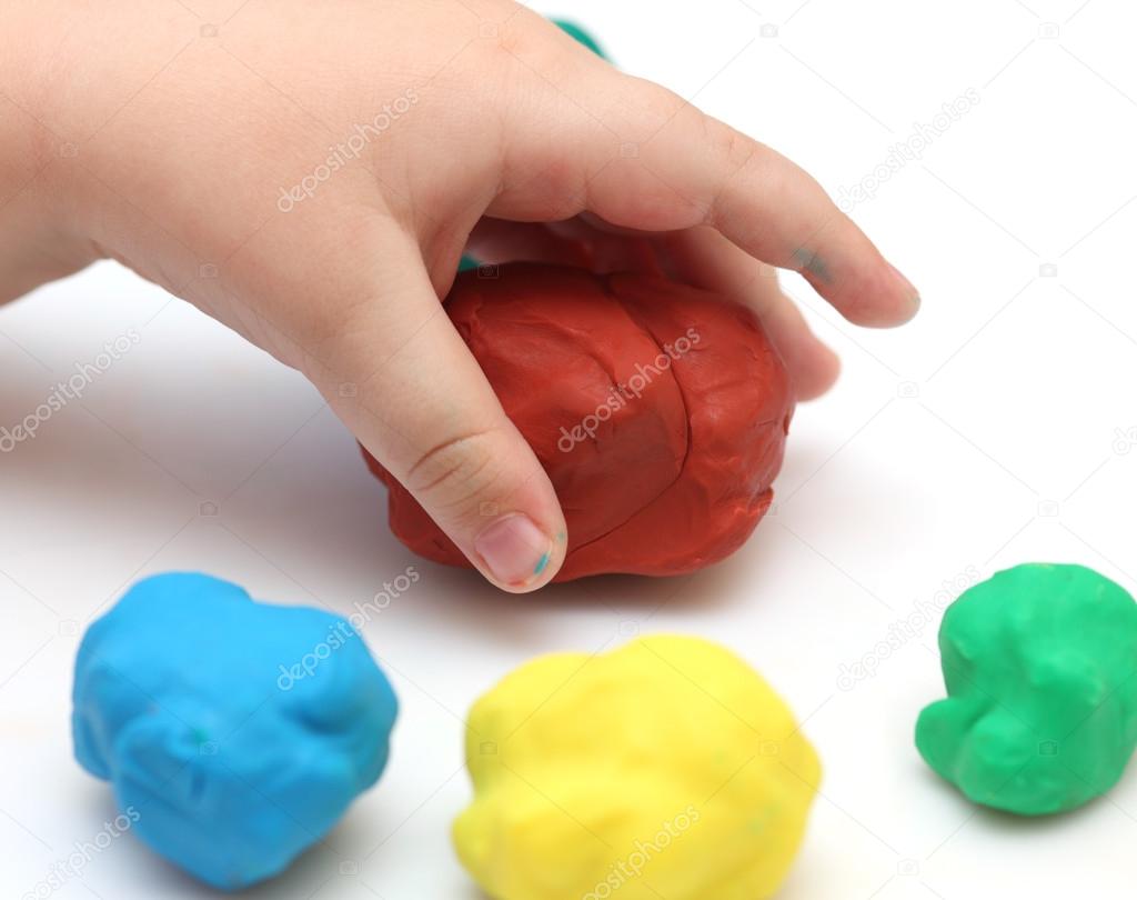 Child's hand with playdough