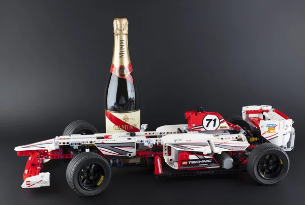 LEGO Technic Grand Prix Racer with bottle of Champagne G.H.Mumm — Stock Photo, Image