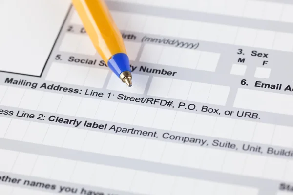 Application form with ballpoint pen — Stock Photo, Image