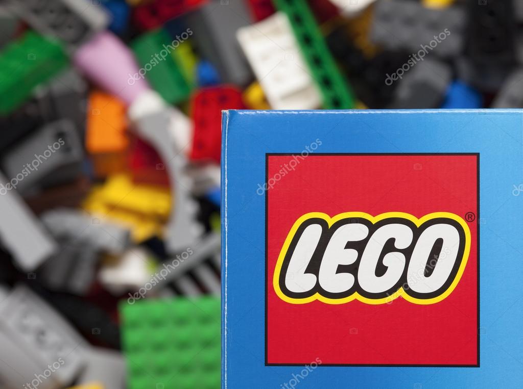 Tambov, Russian Federation - January 12, 2015 Lego logo on the box with Lego blocks background. Adobe RGB. Studio shot.