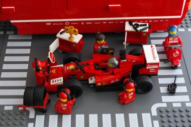Pit stop of Ferrari F14 T race car by Lego Speed Champions clipart