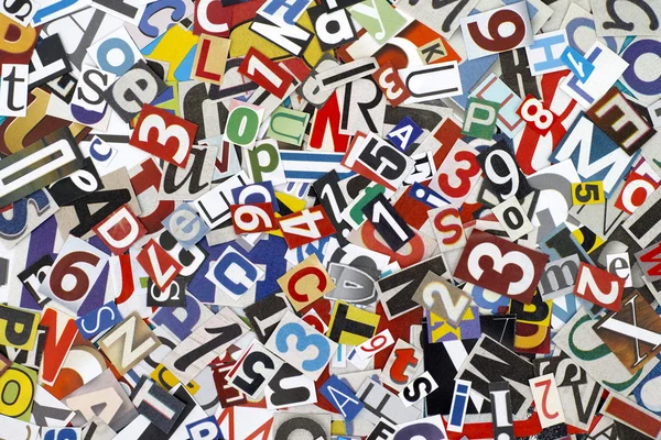 Cut out letters and numbers — Stock Photo, Image