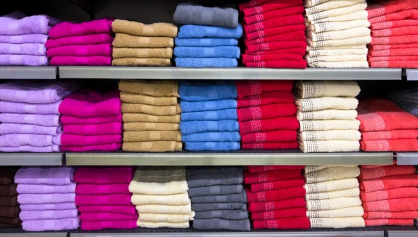 Stacks of multicolored towels — Stock Photo, Image