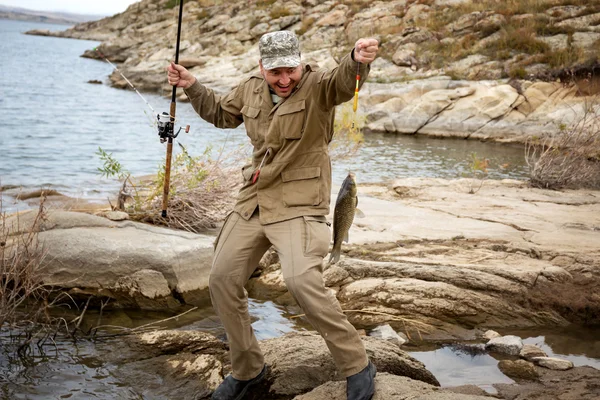 Fiske-fan på sjön — Stockfoto