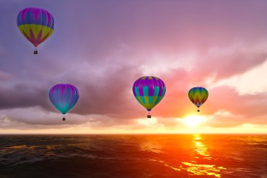 Deniz üzerinde renkli sıcak hava balonları