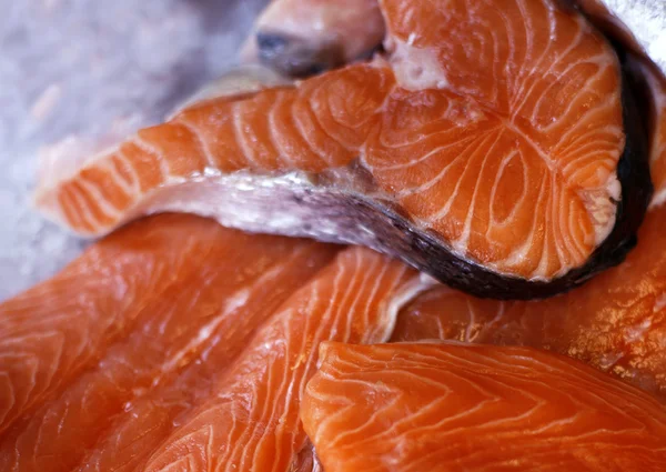 Salmon steaks on ice, on display in fish store — Stock Photo, Image
