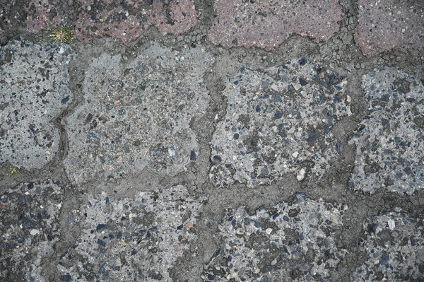 Old dirty wall close up. Grunge abstract photo background. Beautiful stone texture pattern.