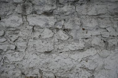 Eski kirli duvar kapanıyor. Grunge soyut fotoğraf arkaplanı. Güzel taş dokusu deseni.