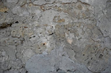 Eski kirli duvar kapanıyor. Grunge soyut fotoğraf arkaplanı. Güzel taş dokusu deseni. İşlem sonrası ve tasarım için iyi