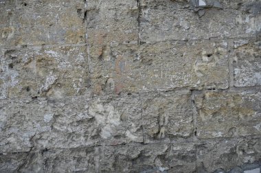 Eski kirli duvar kapanıyor. Grunge soyut fotoğraf arkaplanı. Güzel taş dokusu deseni. İşlem sonrası ve tasarım için iyi